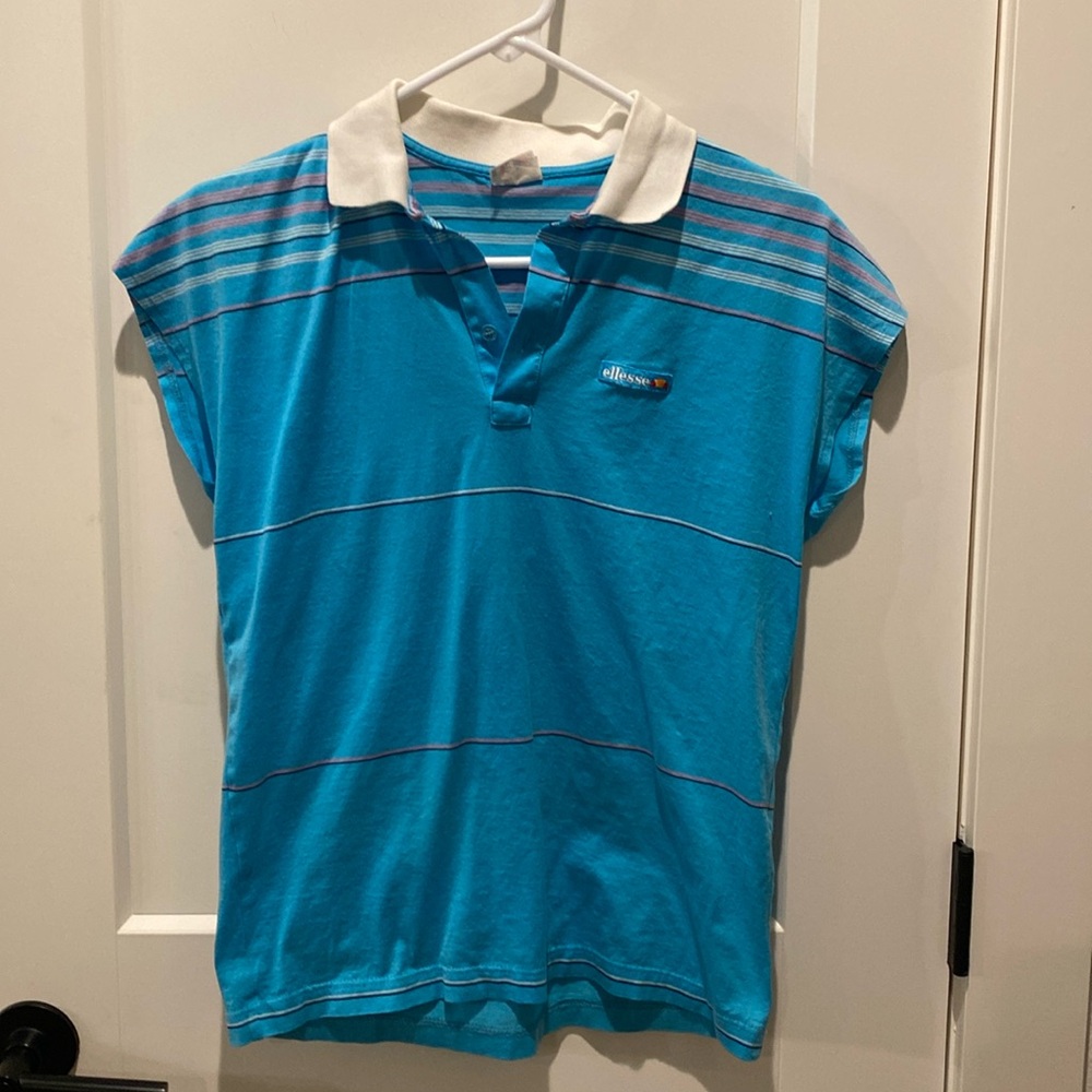 Ellesse Ladies‎ Sleeveless Tennis Shirt.  Size 12.  Blue.  Pit to pit is 17”